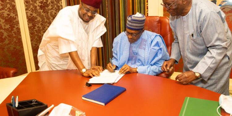 Nigerian President Muhammadu Buhari signs the Nigerian Startup Bill Into Law